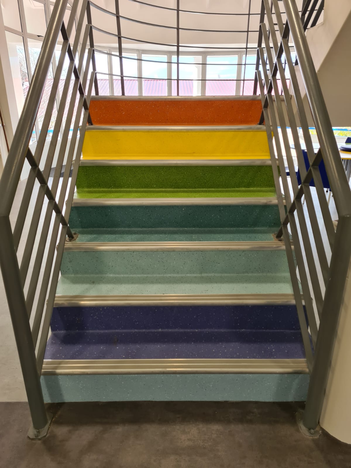 Colour blocking for navigation and safety with vinyl flooring at SACS Junior High School - Polyflor, Western Cape installation